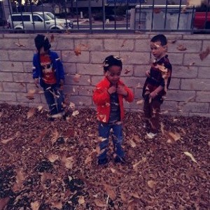 Children Playing In The Leaves